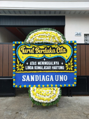 Papan Bunga Duka di Kadu Agung